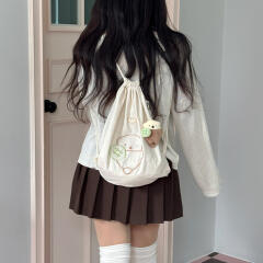 메론빵을 좋아하는 아기해달 스트링백팩